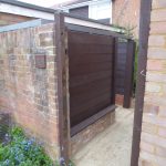 Recycled plastic slats form the shed coverage